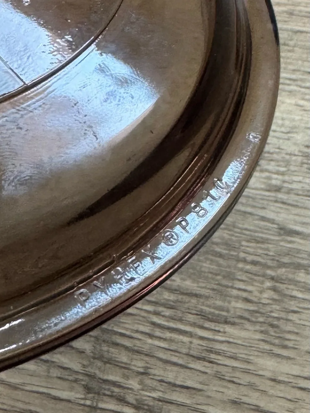 vintage Pyrex Amber lid, specifically model P-81-C.The lid is part of the Cornin